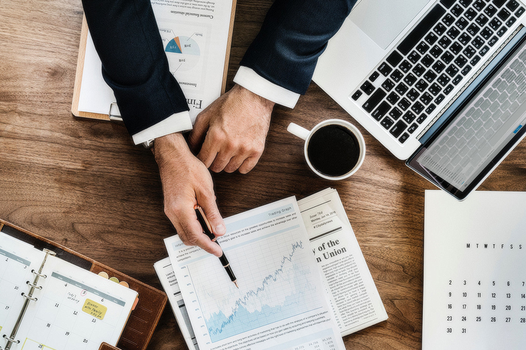 Business person working on financial projections.