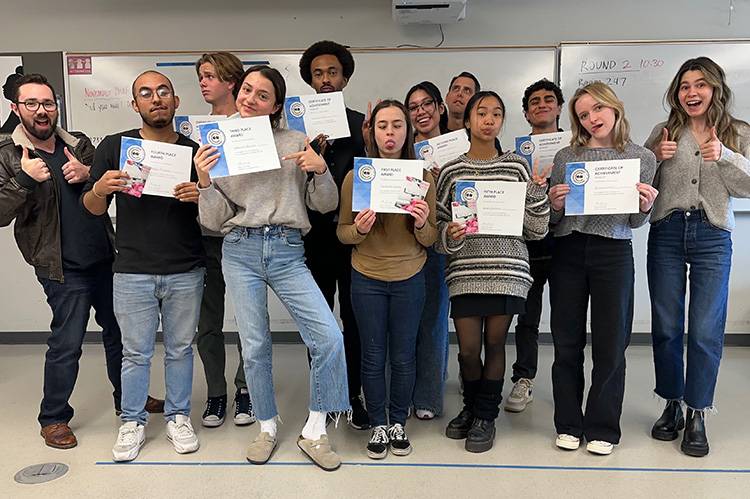 Group of students with awards