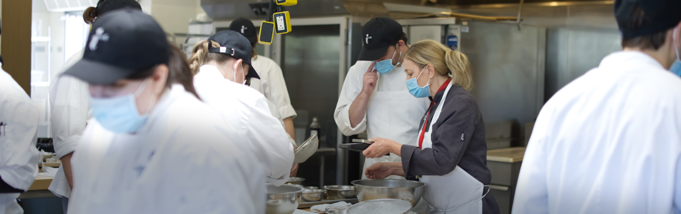iCUE students and instructor in the kitchen.