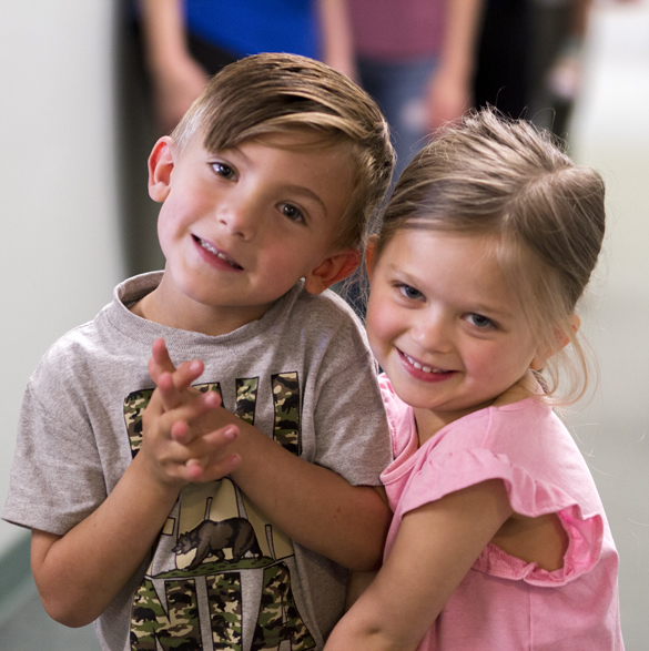 Brother and sister at the Center for Early Childhood Education. 