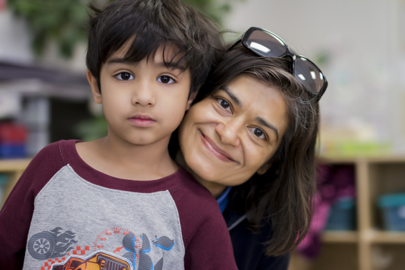 Child with mother at Center for Early Childhood Education. 