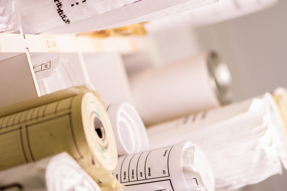 Rolls of Interior Design blueprints. 