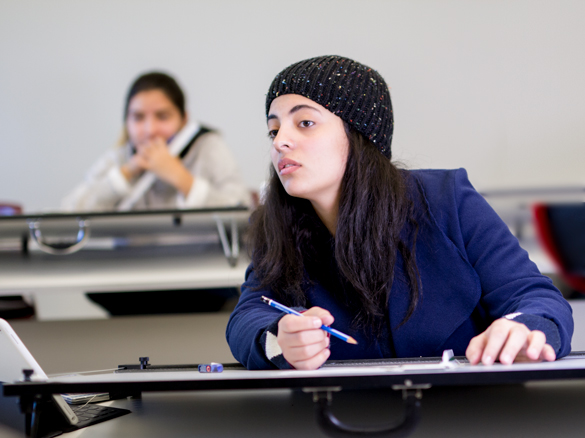 Interior Design student listening in class. 