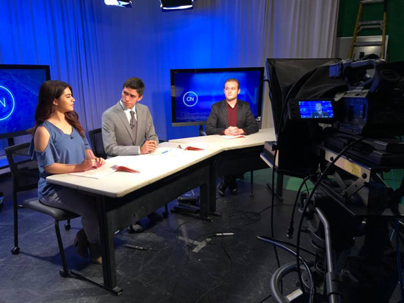 Cougar News, New Media Journalism recording in studio.