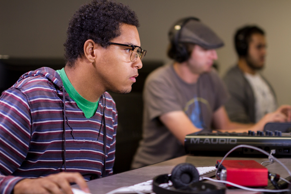Media Entertainment Arts student working on film/video editing project. 