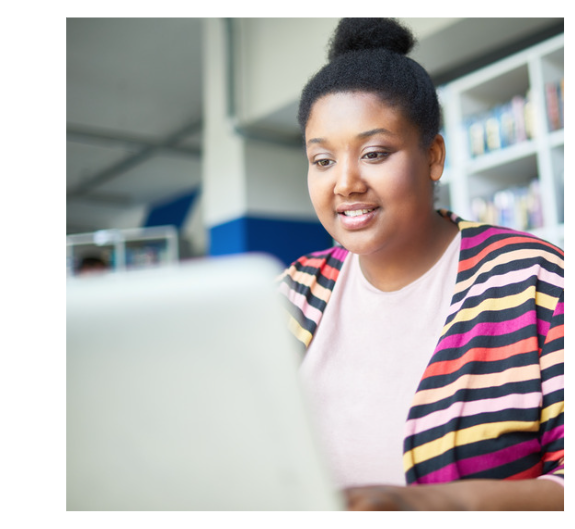 woman looking at laptop screen