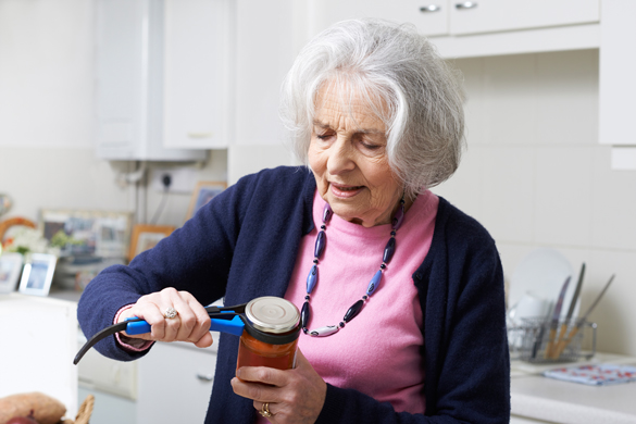 Woman opening a can.