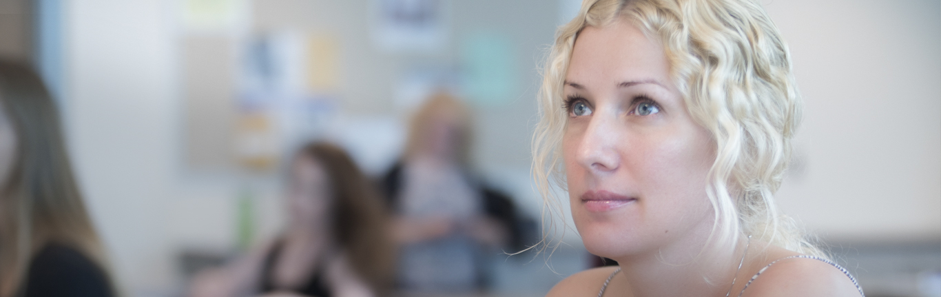 Business student in class. 