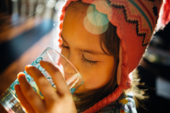 Child drinking water.
