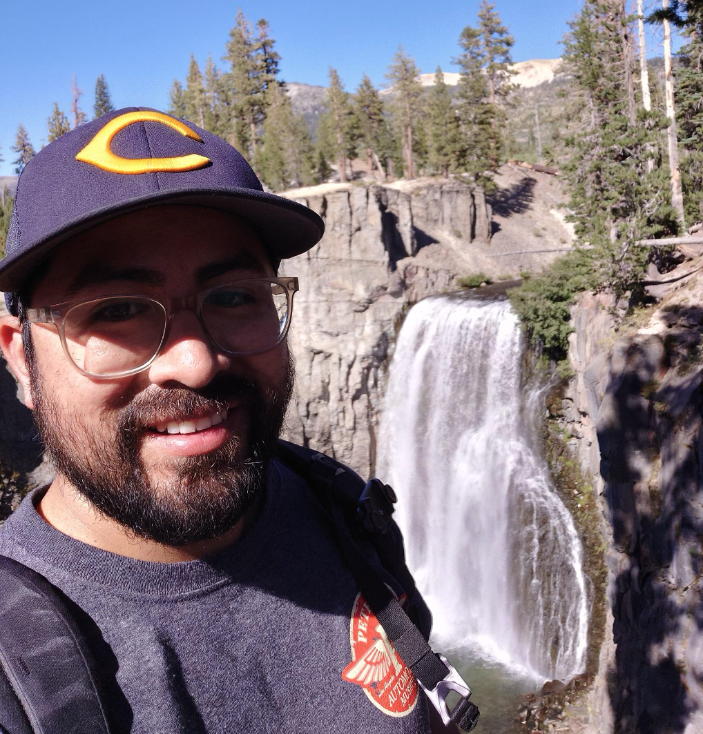 Josue Zepeda selfie in front of a waterfall