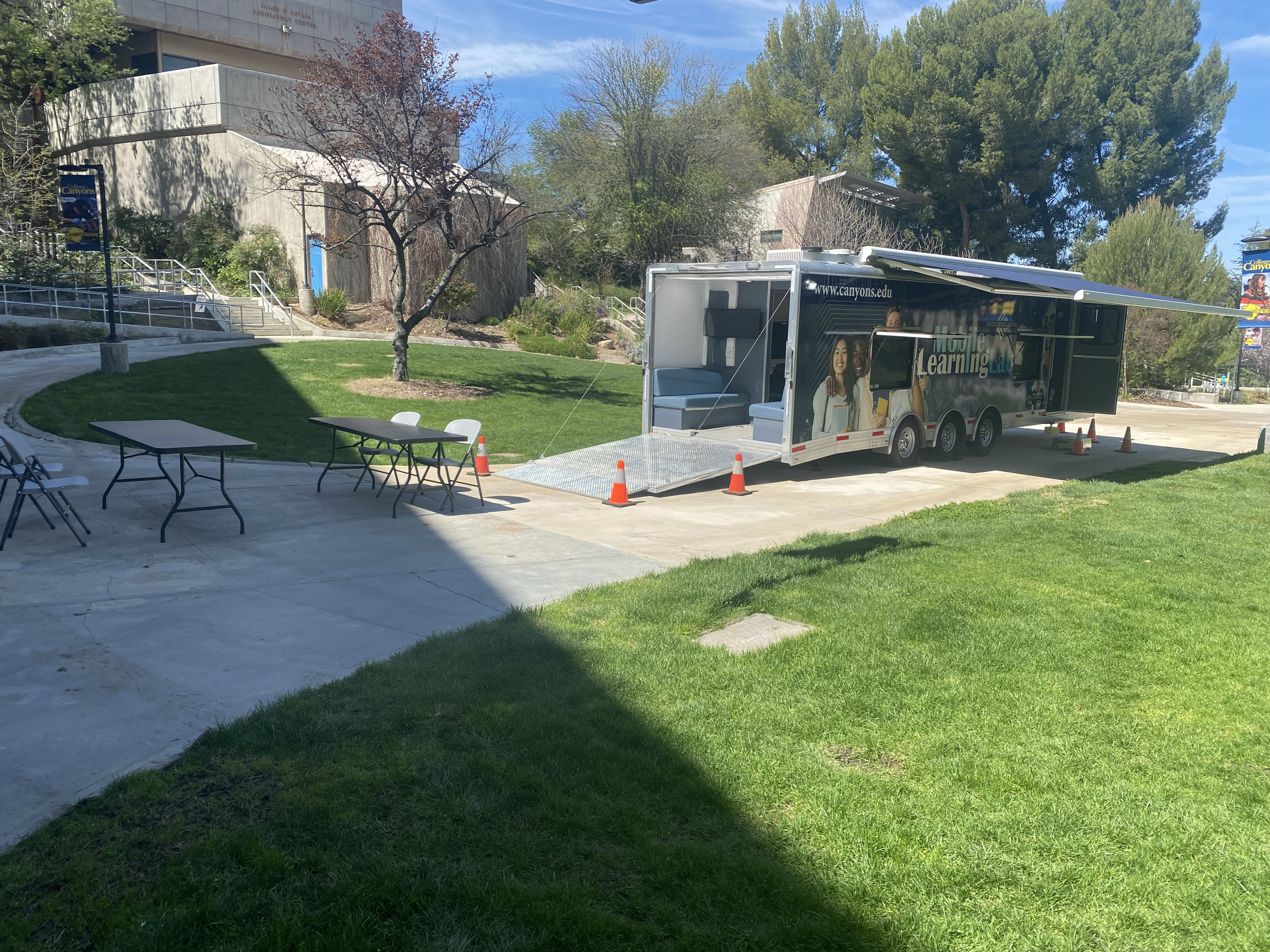 A 35 foot trailer with 3 axels and a mobile classroom.