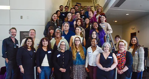 Paralegal Studies graduates pose with program faculty and staff