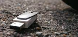 usb drive on the ground