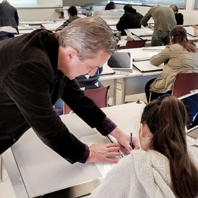 Instructor with student.