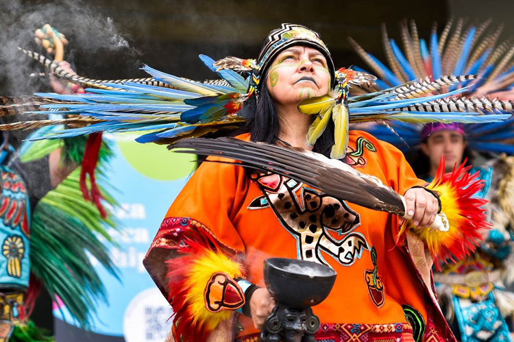 Tribal Indian Man dancing in cultural garments.
