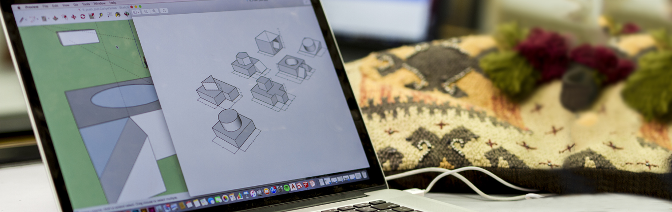 Architecture student working in architectural software program.