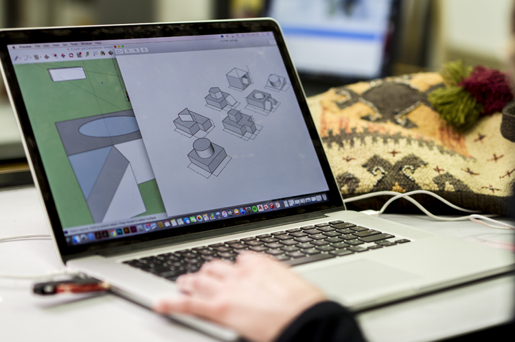 Architecture student working in architectural software program.