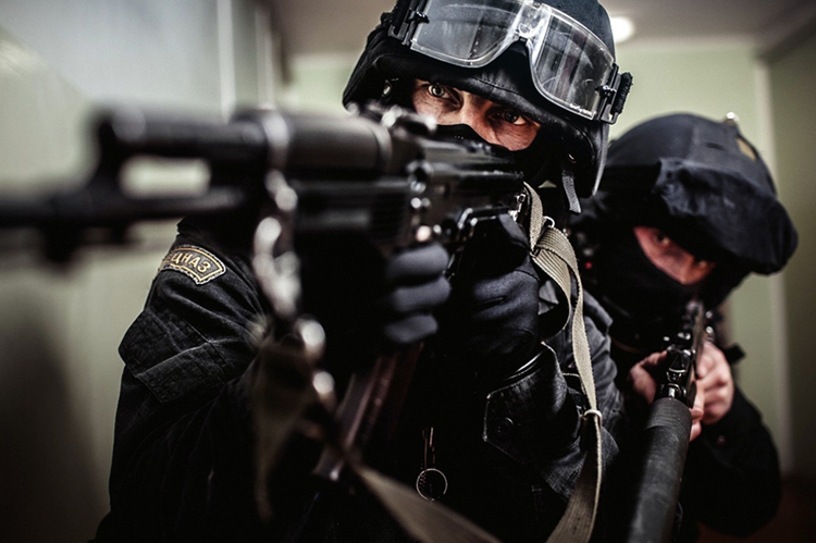 Police Officer with Long Rifle